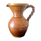 Sandstone jug with twisted handle