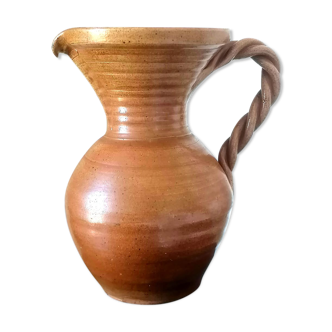Sandstone jug with twisted handle