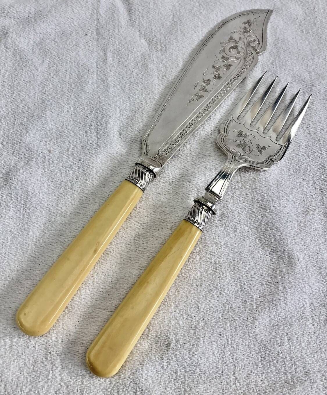 Antique Victorian fish serving cutlery, bone and silver-plated metal