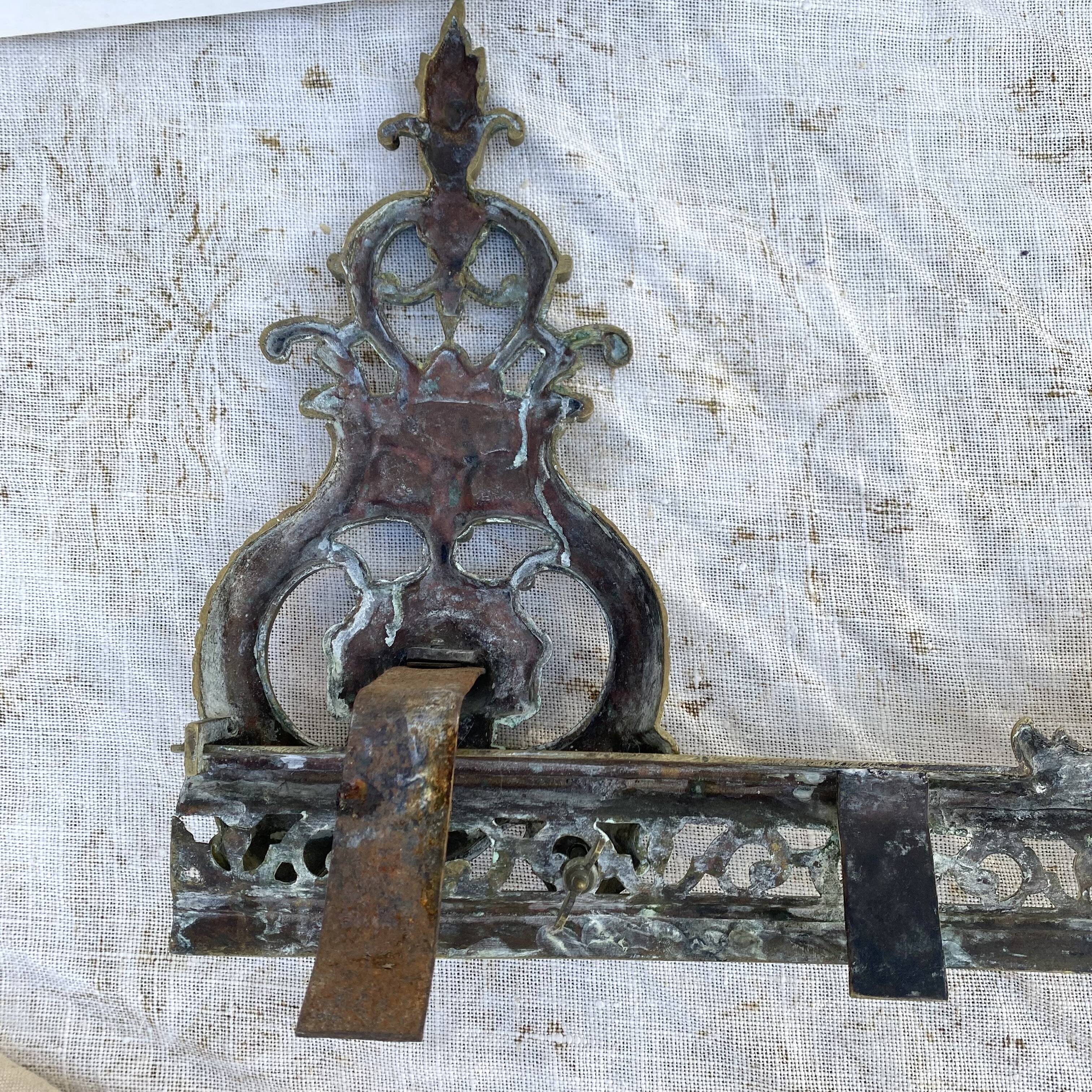 Antique brass fireplace set, bar and andirons, Napoleon I style.