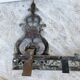 Antique brass fireplace set, bar and andirons, Napoleon I style.
