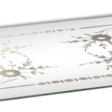 Top mirror to Central décor of flowers.