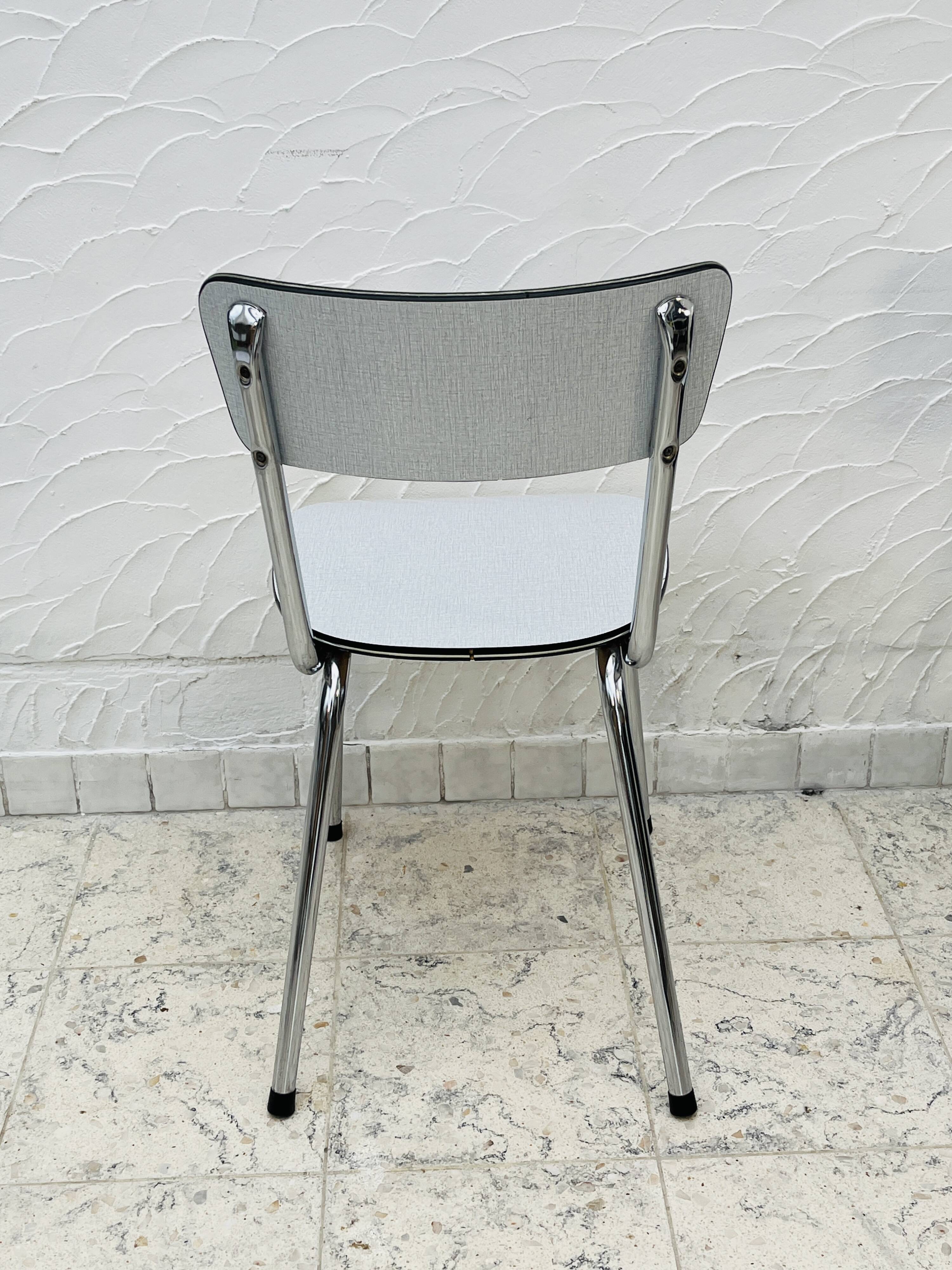 Set of 4 vintage grey chrome Formica kitchen chairs.