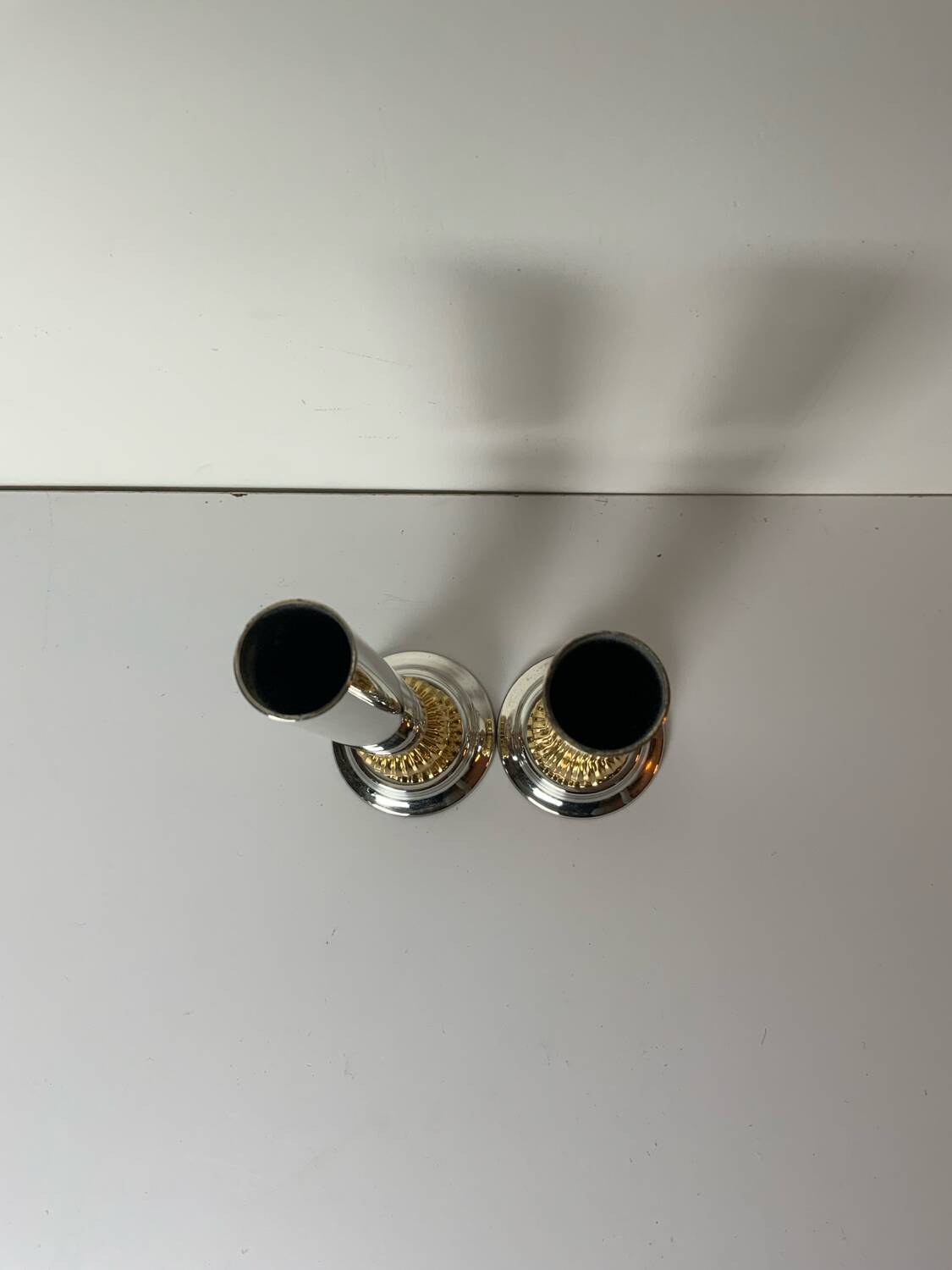 Pair of metal candlesticks