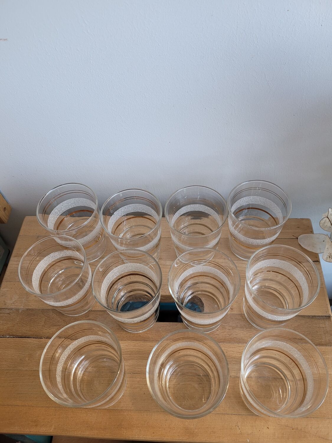 Set of 11 granite glass cups and golden edging