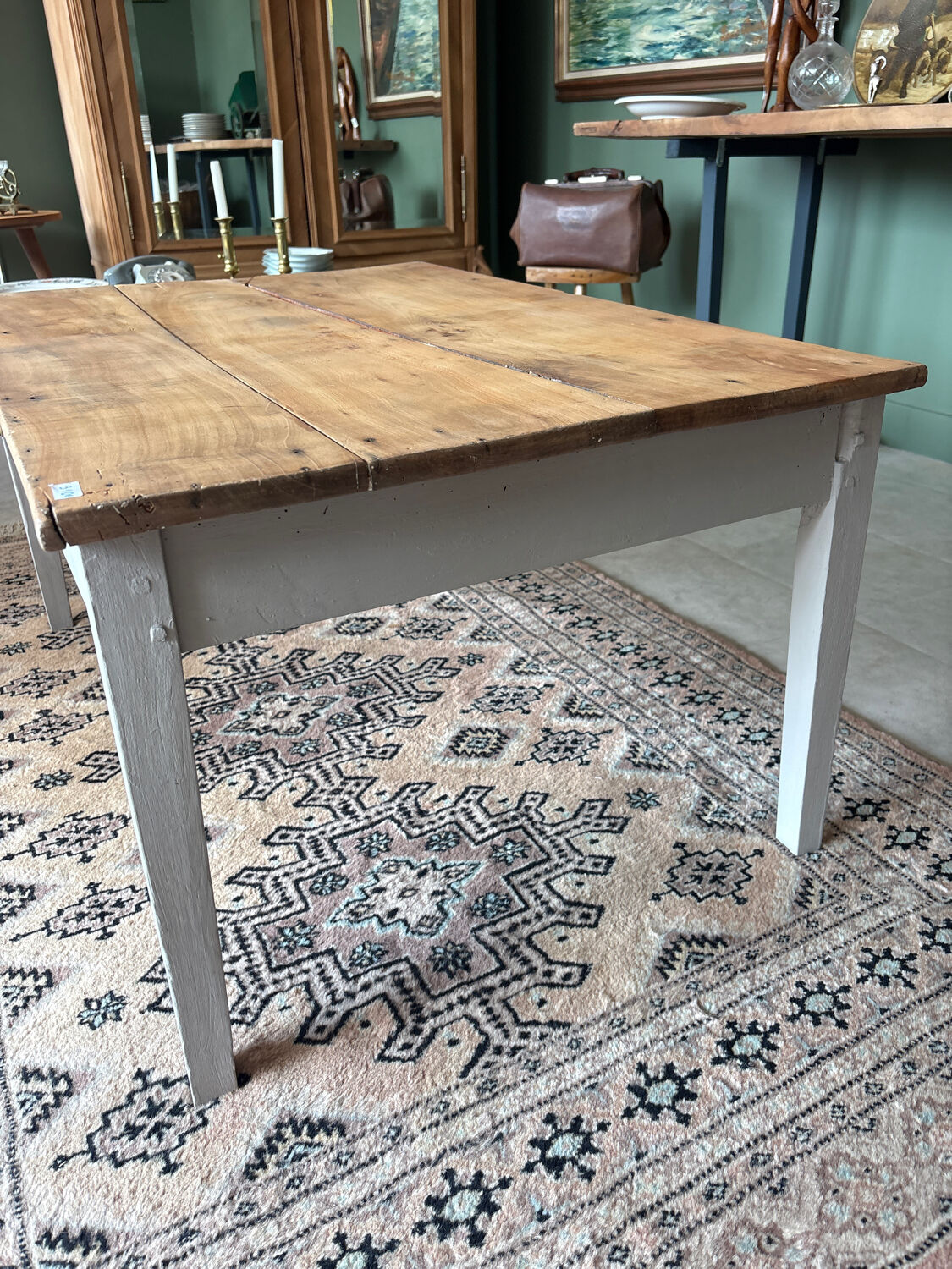 Coffee table with sandblasted top and painted legs.