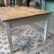 Coffee table with sandblasted top and painted legs.