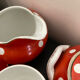 Coffee service, orange earthenware cups from Digoin Sarreguemines.
