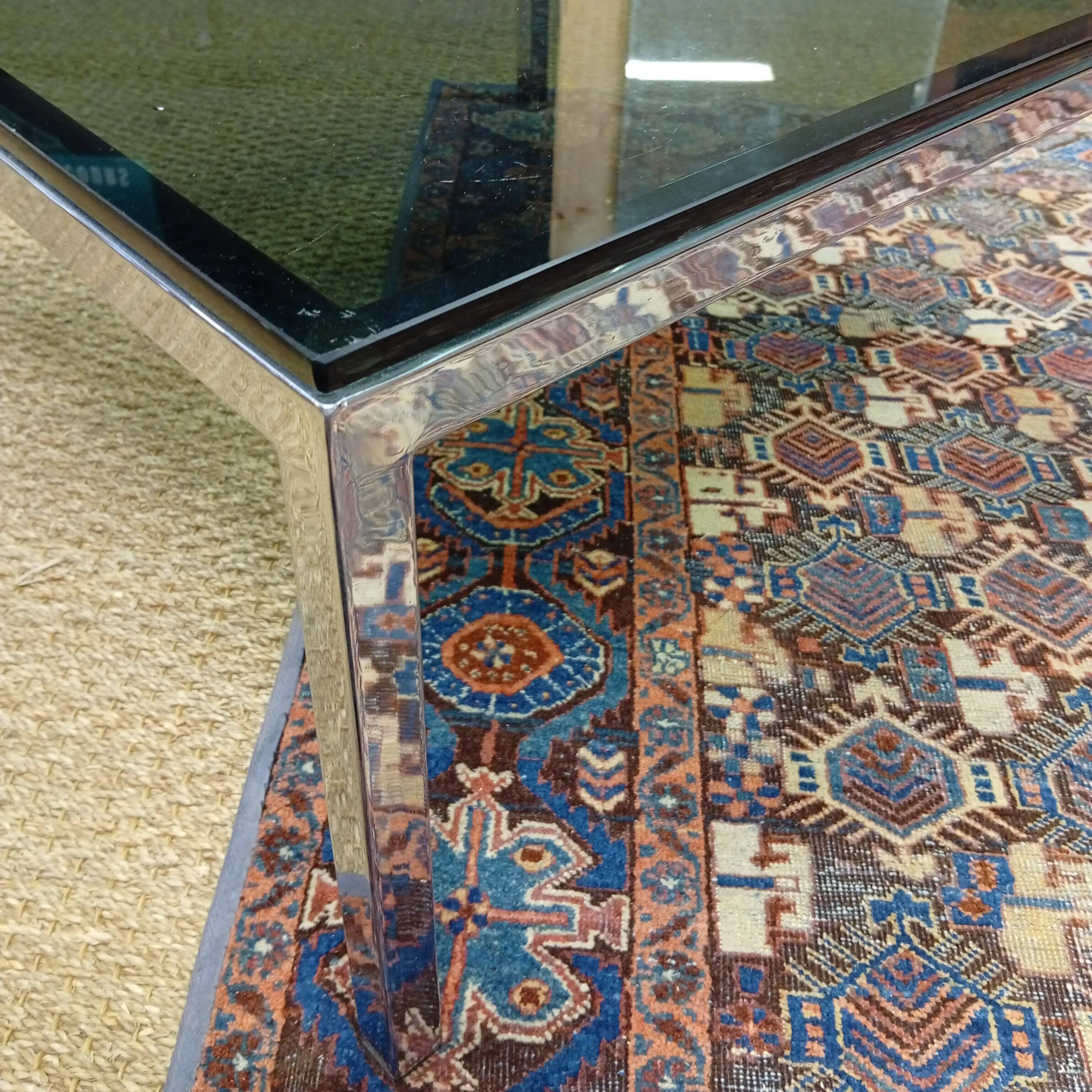 Chrome coffee table with a glass top from the 1980s.