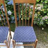 4 vintage Roche Bobois chairs from the 80s in beech with woven seats in blue fabric.