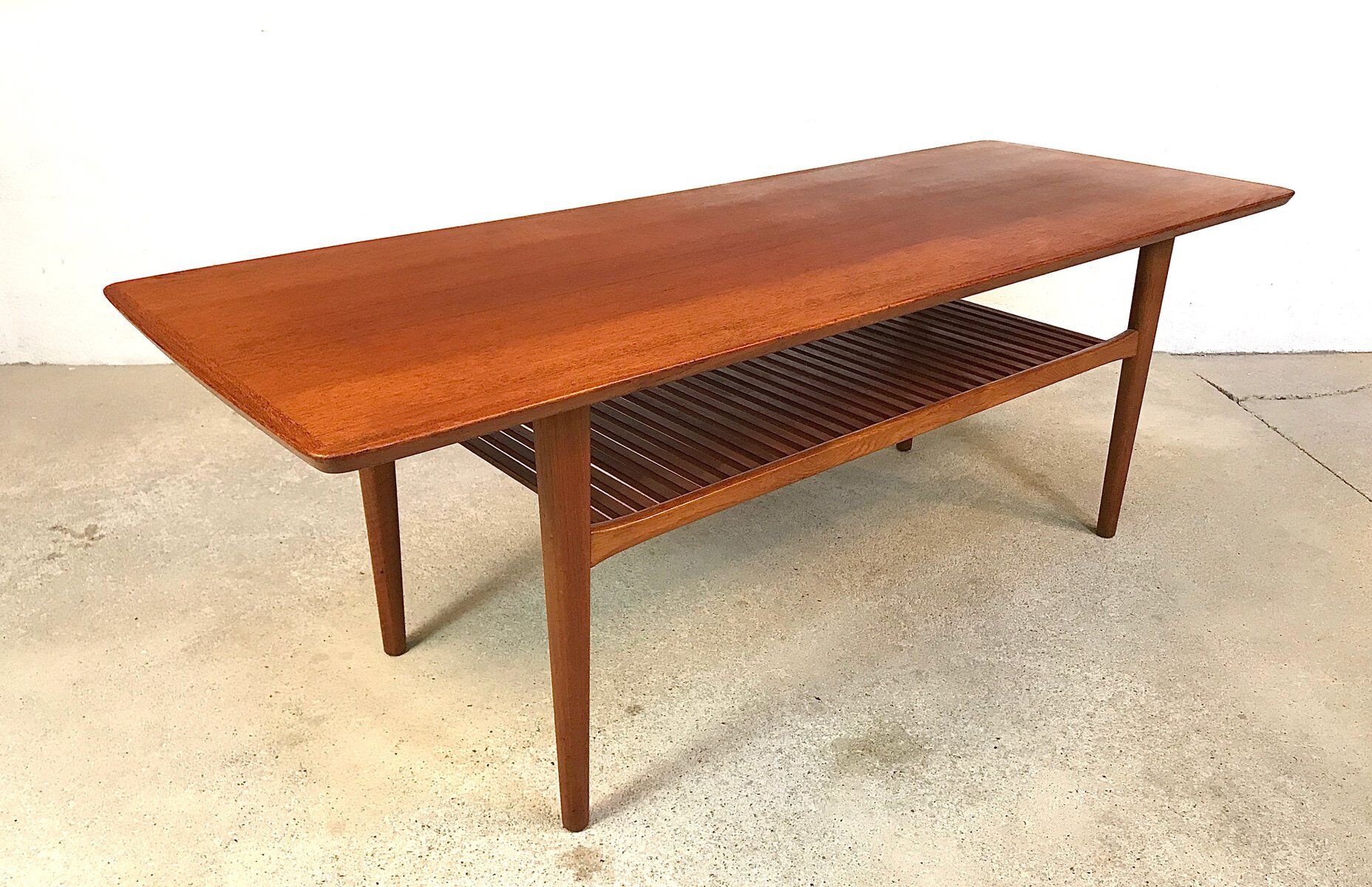 Scandinavian teak coffee table with slatted shelf, Denmark 1960s