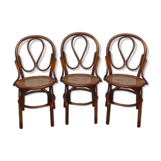 Trio of bamboo chairs