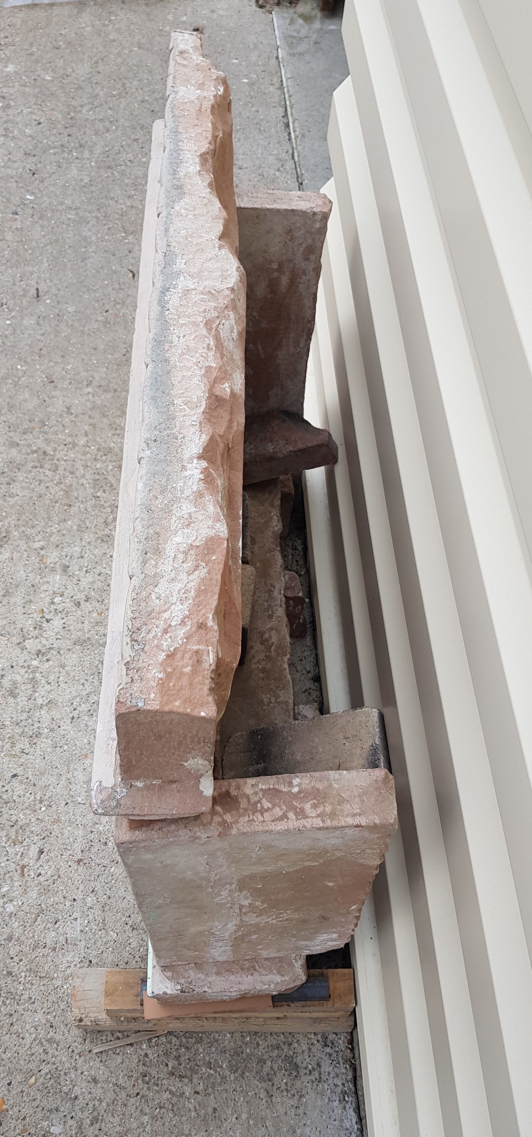 Fully hand-carved stone window with mirror