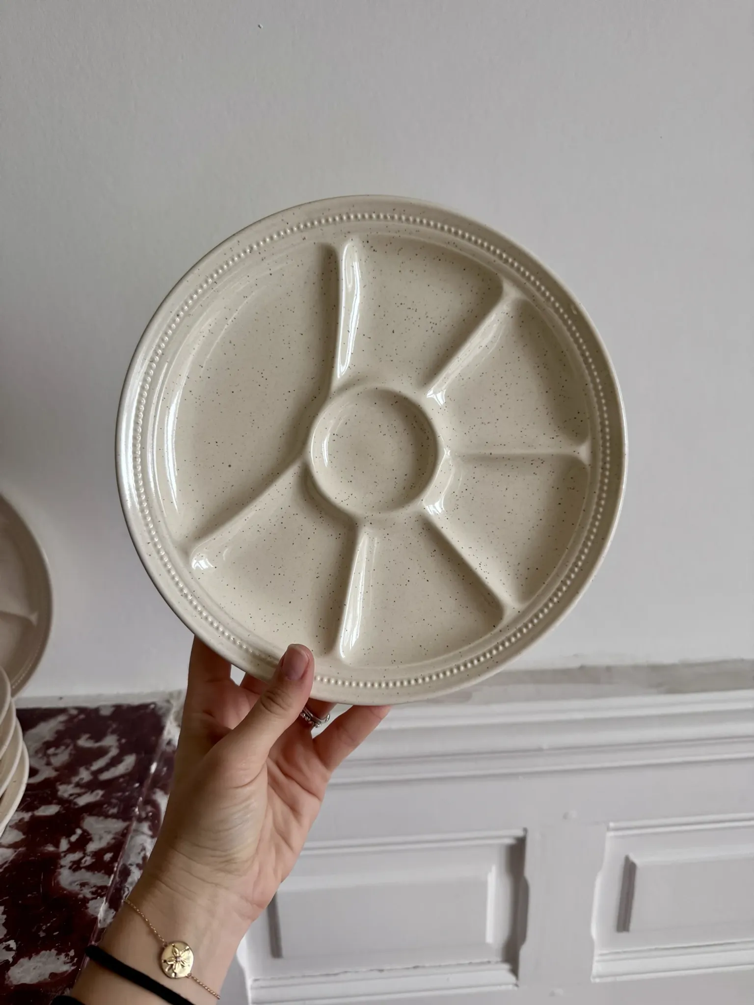 The earthenware fondue plates from Haute-Provence.