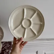 The earthenware fondue plates from Haute-Provence.