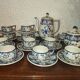 Henriot Quimper earthenware coffee set with floral decoration and elegant blue