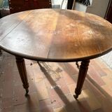 Round drop-leaf table