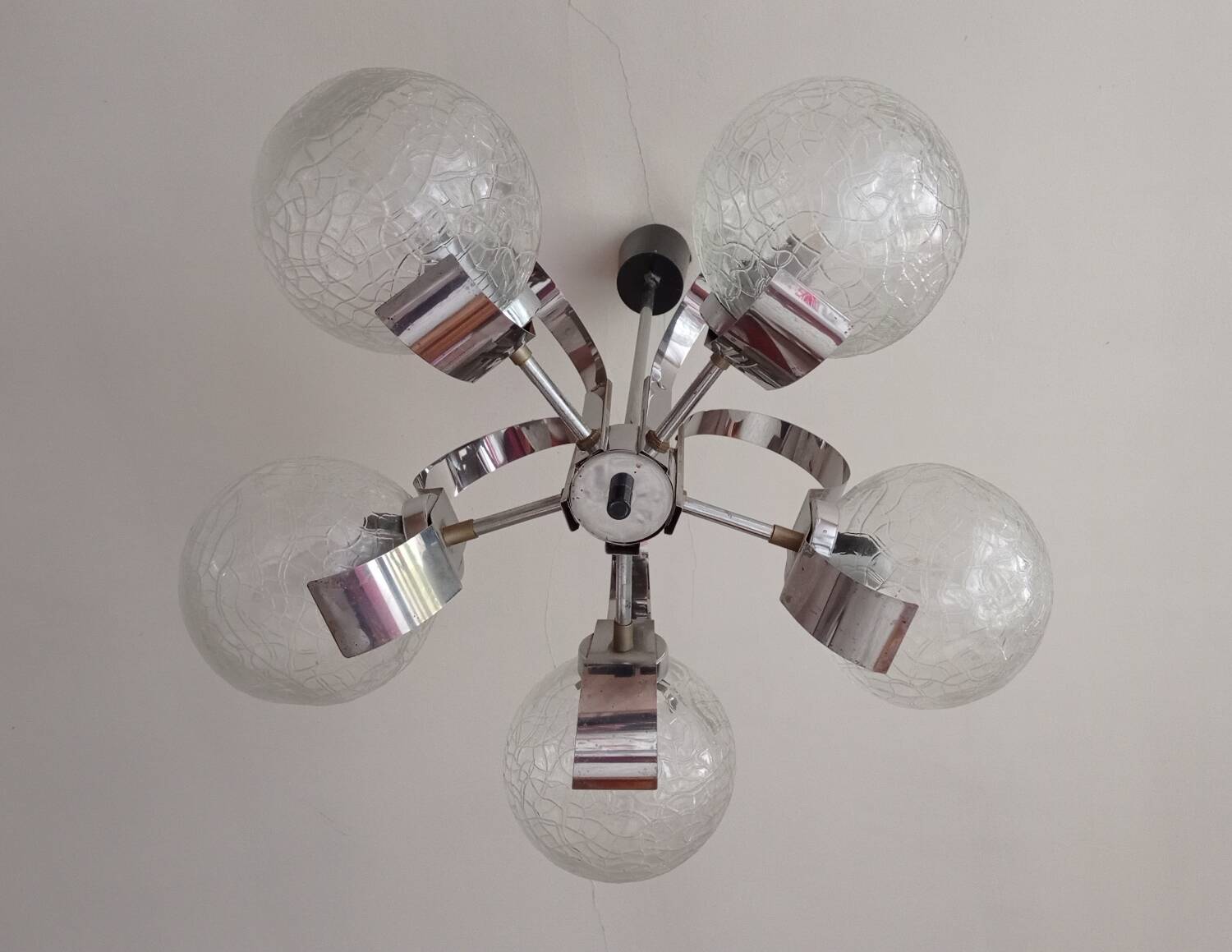Vintage chandelier with glass globes and chrome steel