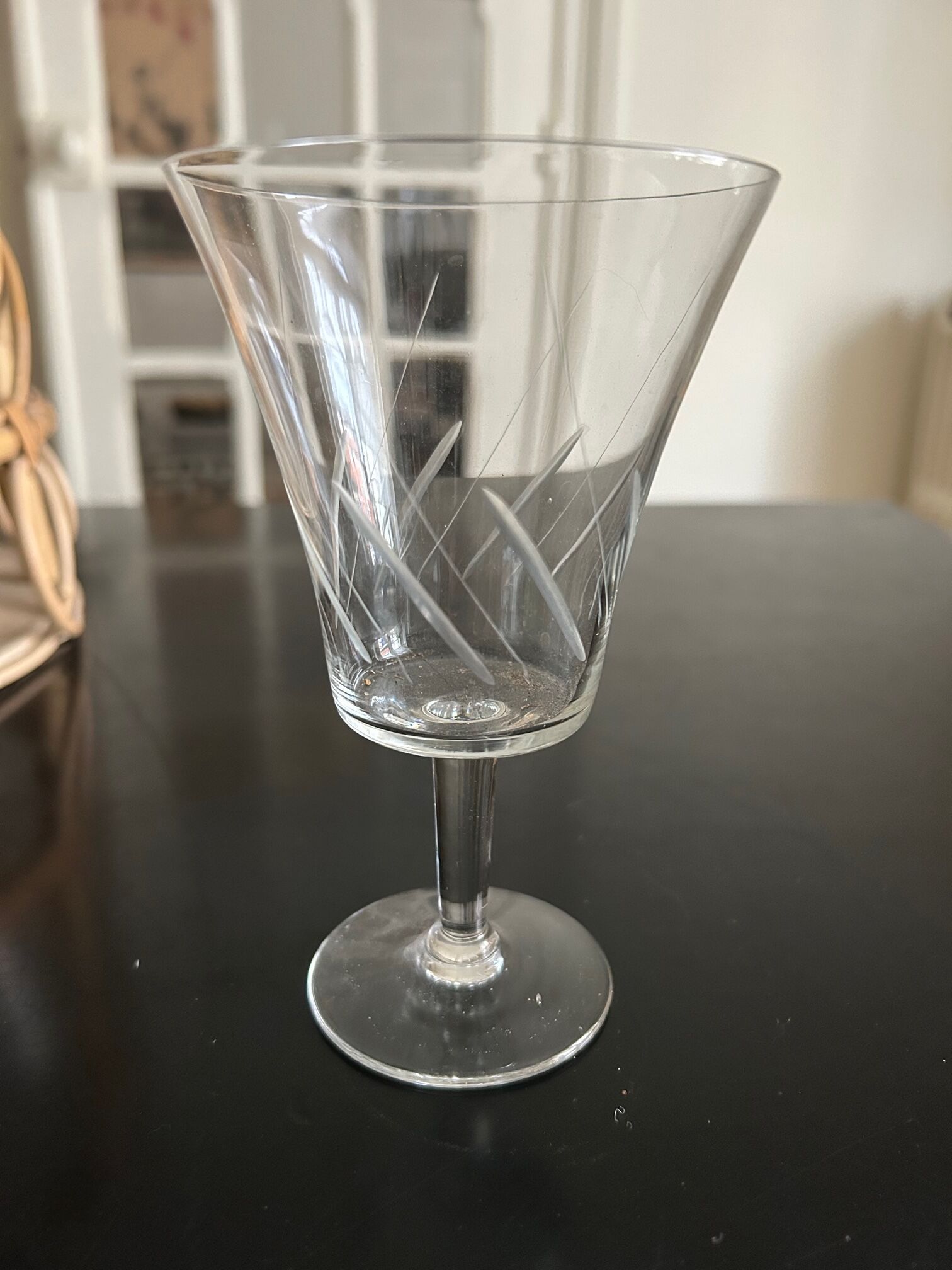 Wicker basket and 8 antique glasses