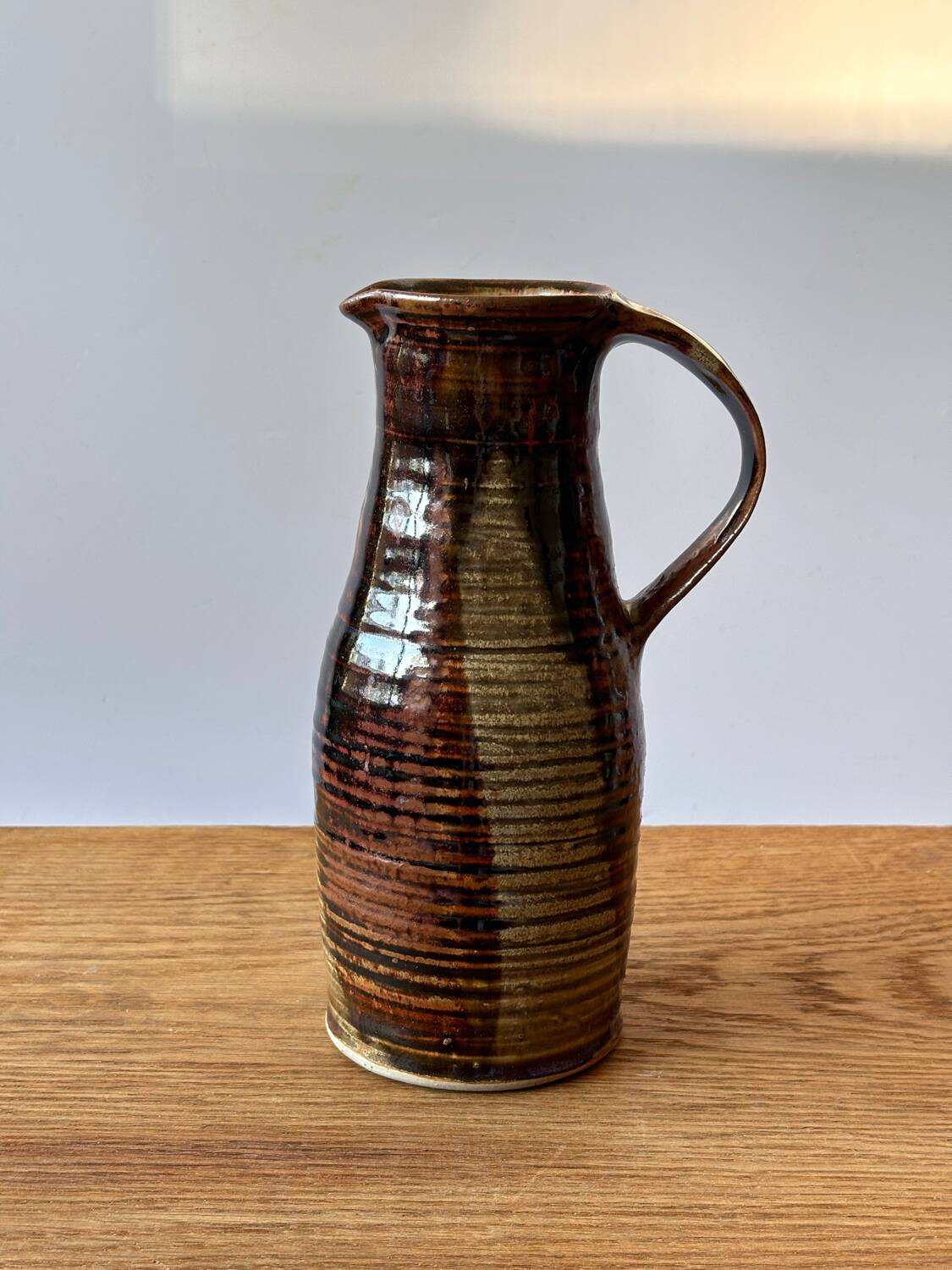 Vintage enameled stoneware pitcher
