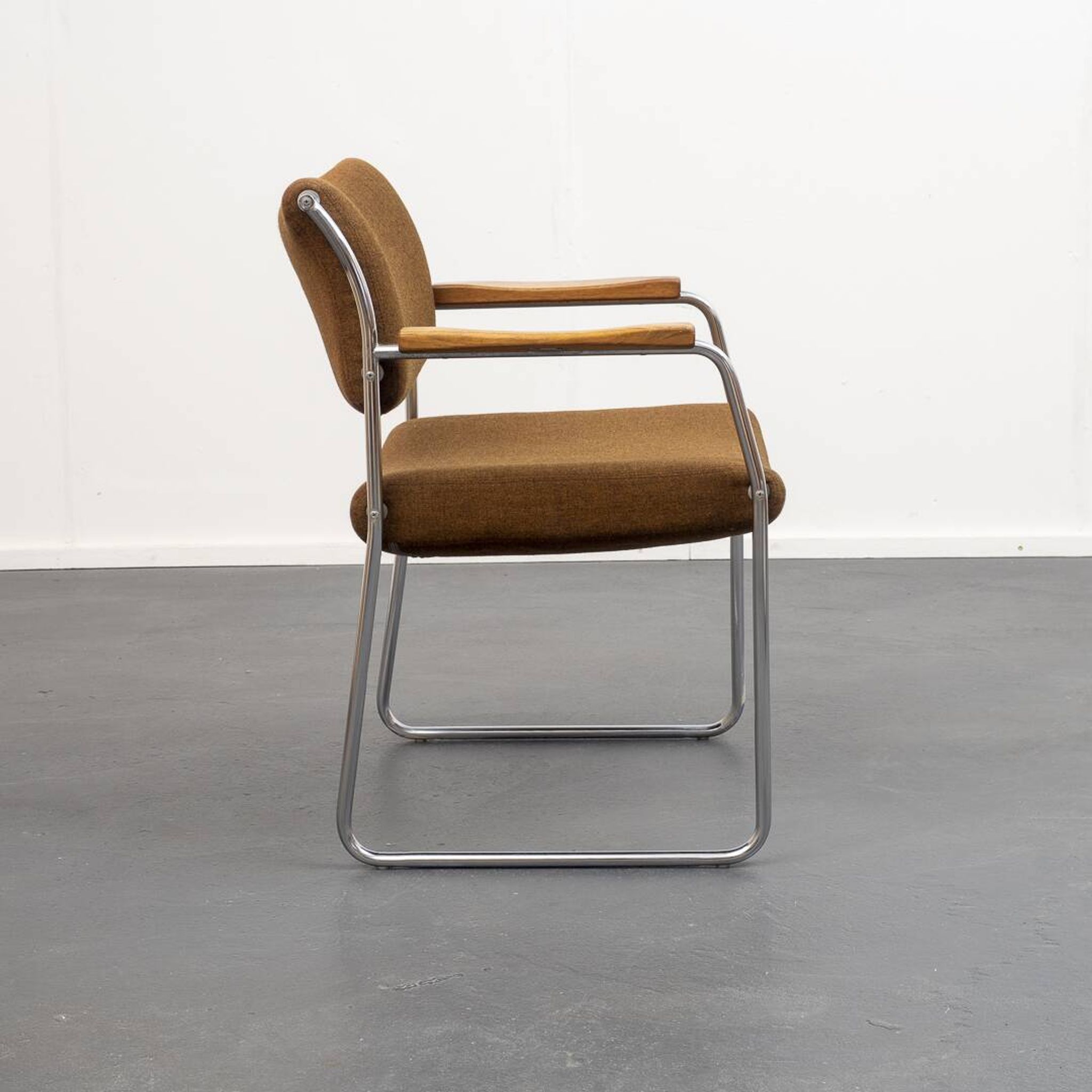 Armchair, 1960s, chrome metal frame, teak armrests.