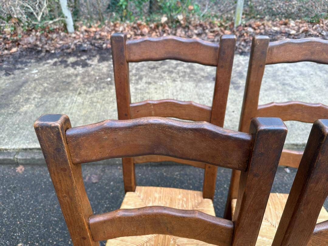 4 dining chairs made of solid wood with straw seats, farmhouse style, medium oak, 20th century, 110cm.