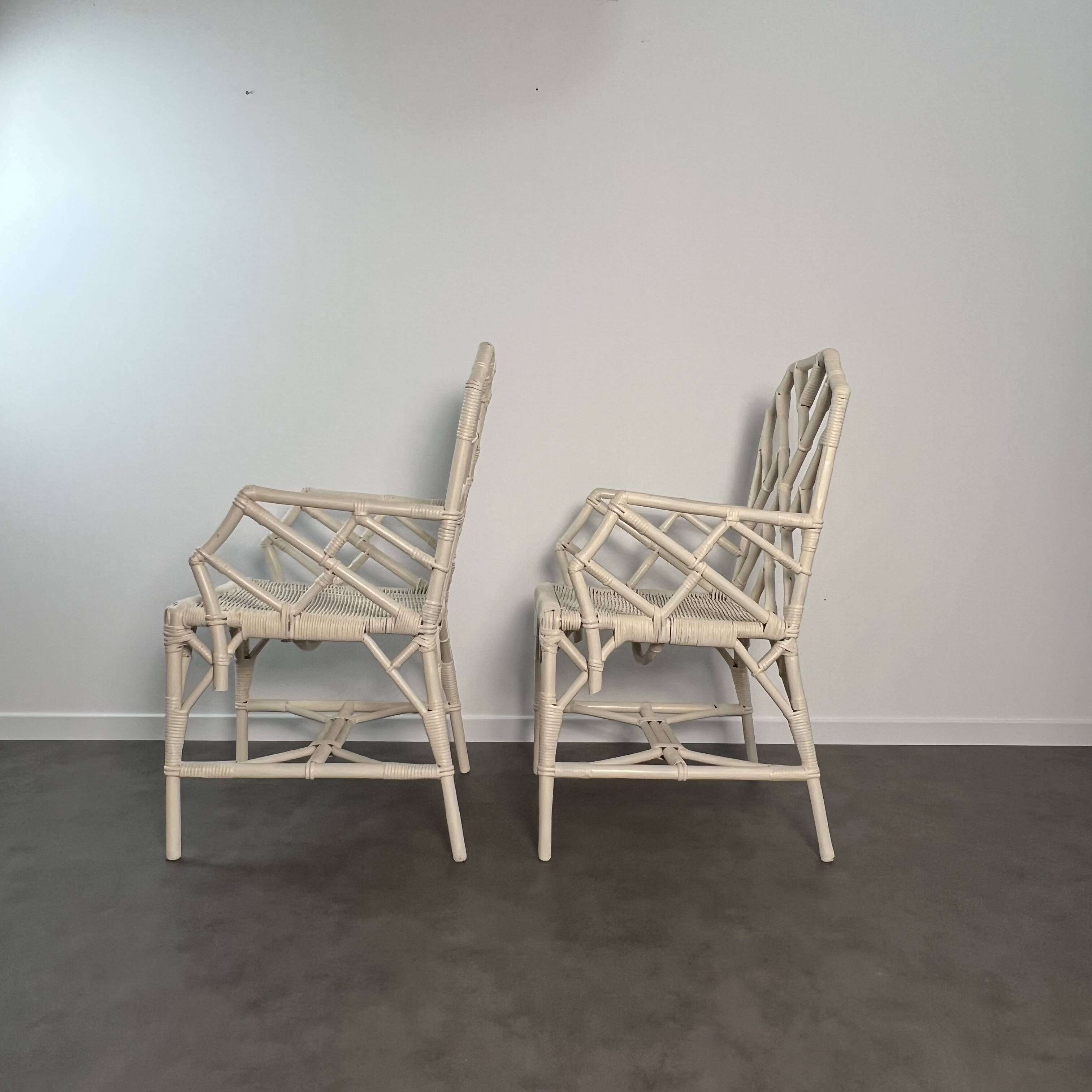 Pair of Angraves armchairs model Invincible in Chinese Chippendale style.