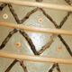 Suspension in mother-of-pearl and wicker