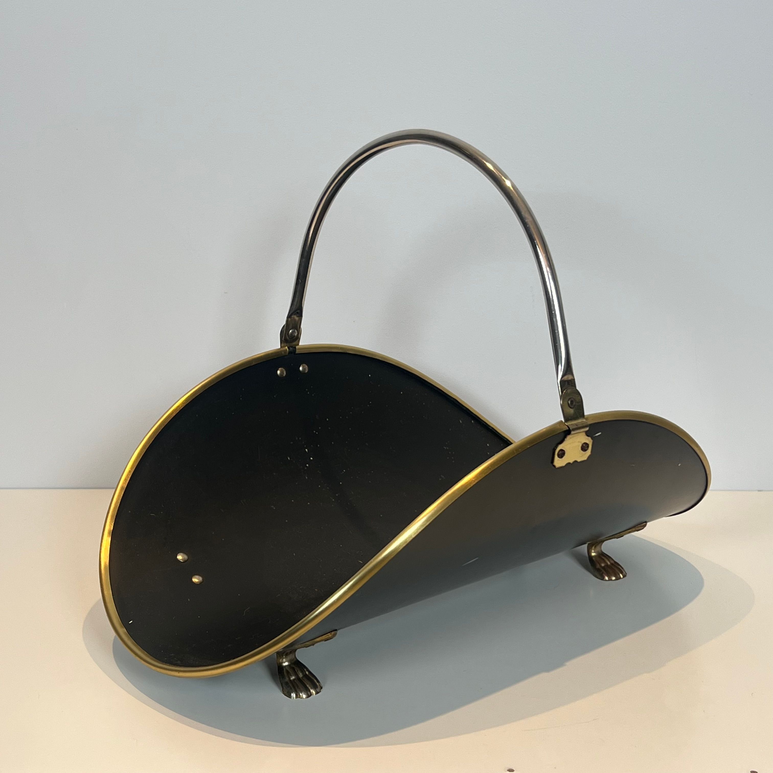 Neoclassical log holder in brass and black lacquered brass