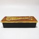 Grand coffret "Paon" en terre estampée, or craquelé et verre