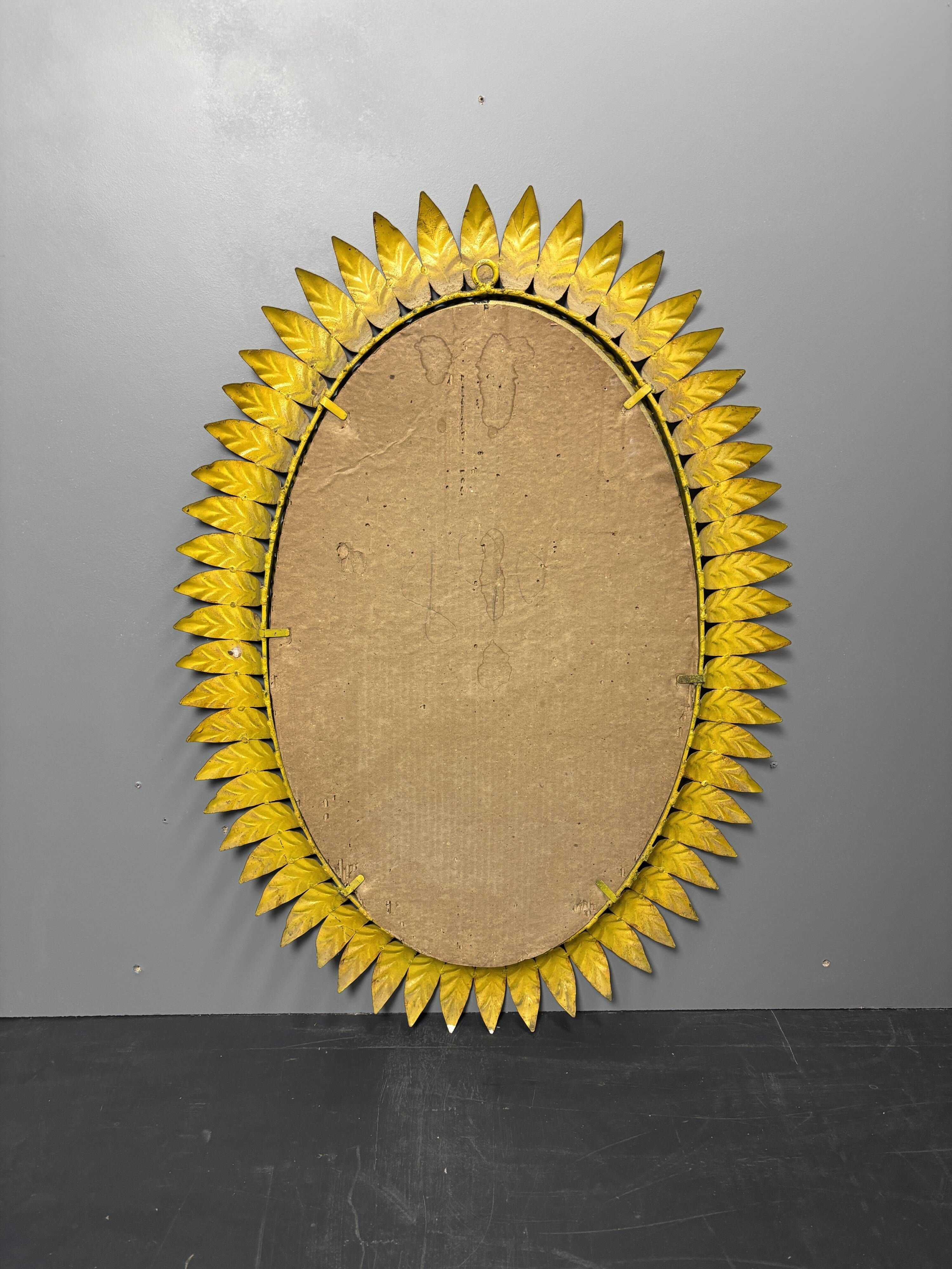 Midcentury bohemian hollywood regency spanish gilt metal sun mirror, 1960s