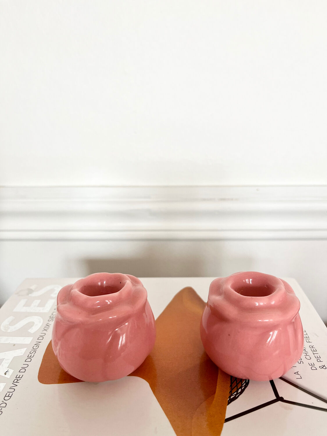 Pair of pink ceramic candle holders