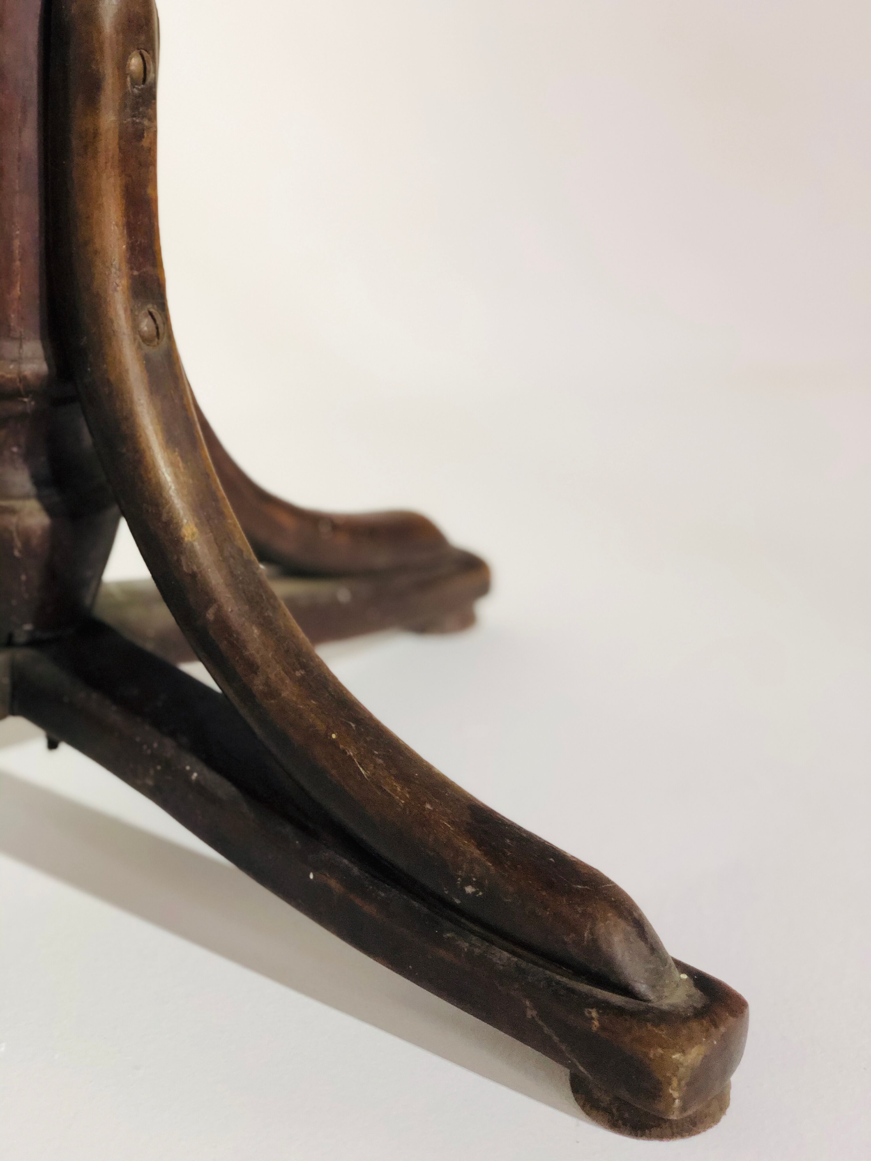 Swivel wooden armchair