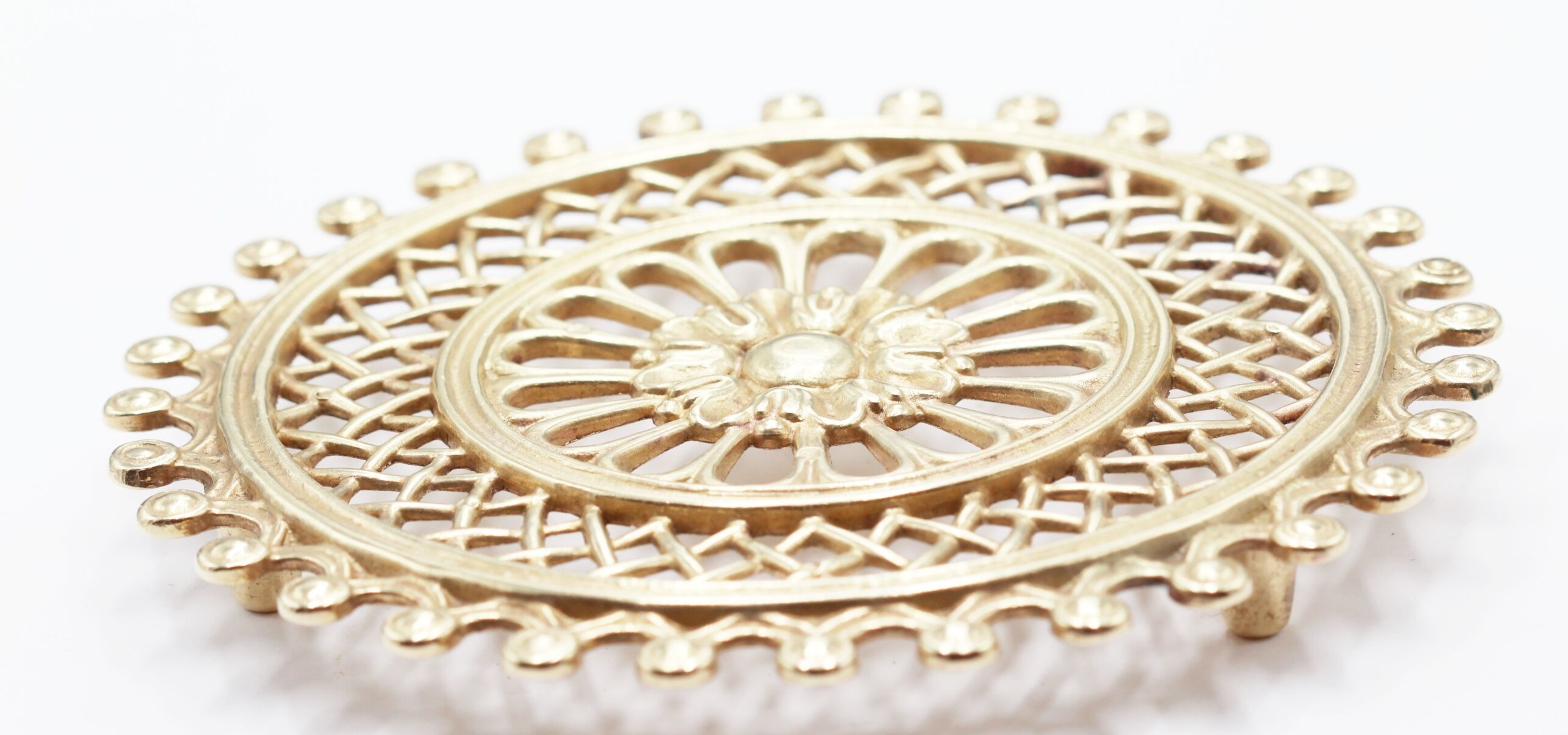 Vintage brass rosette table mat