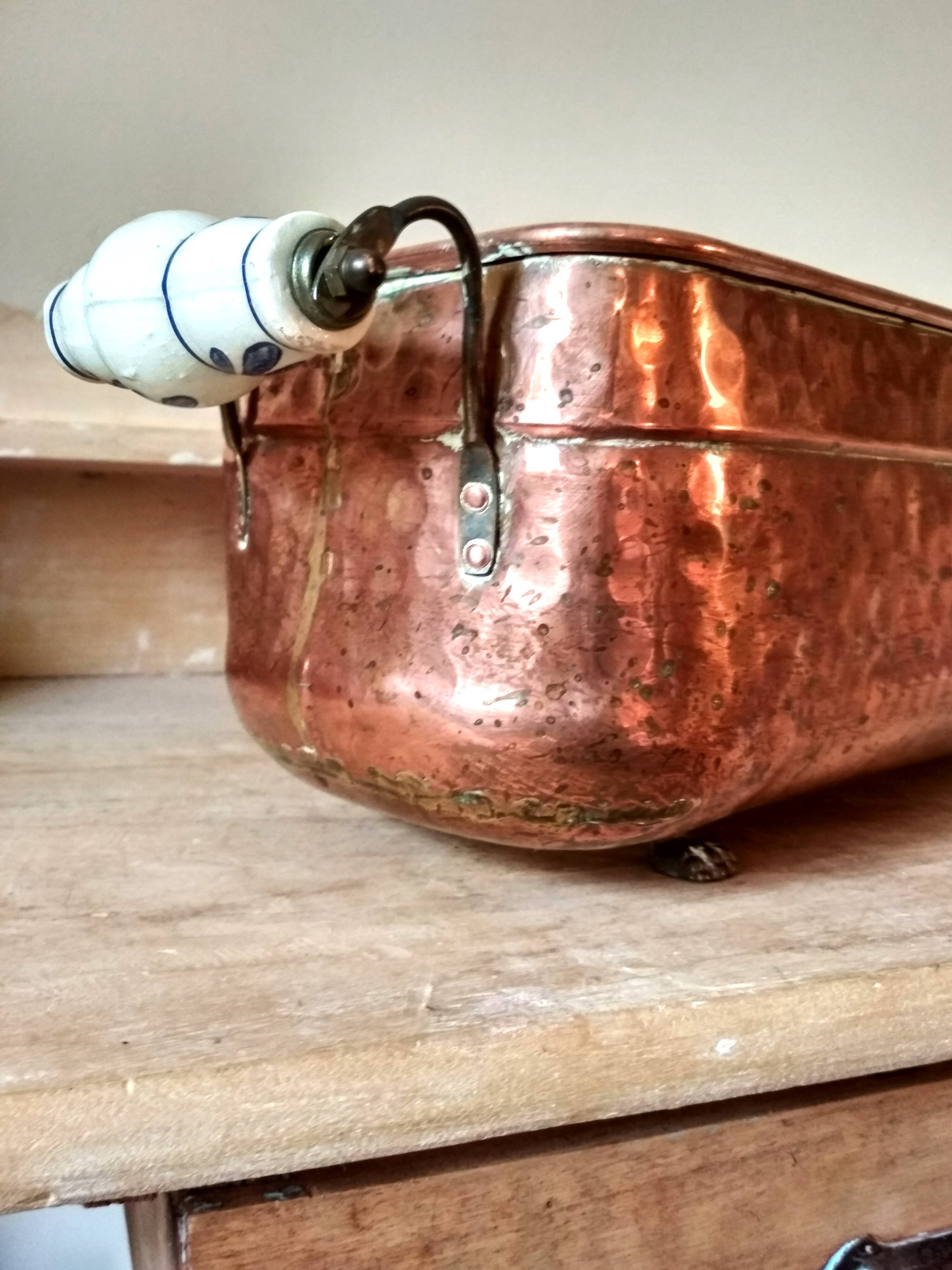 Large brass and copper planter, tray on 4 lion paw feet