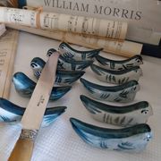 Ceramic knife rest in the shape of birds.