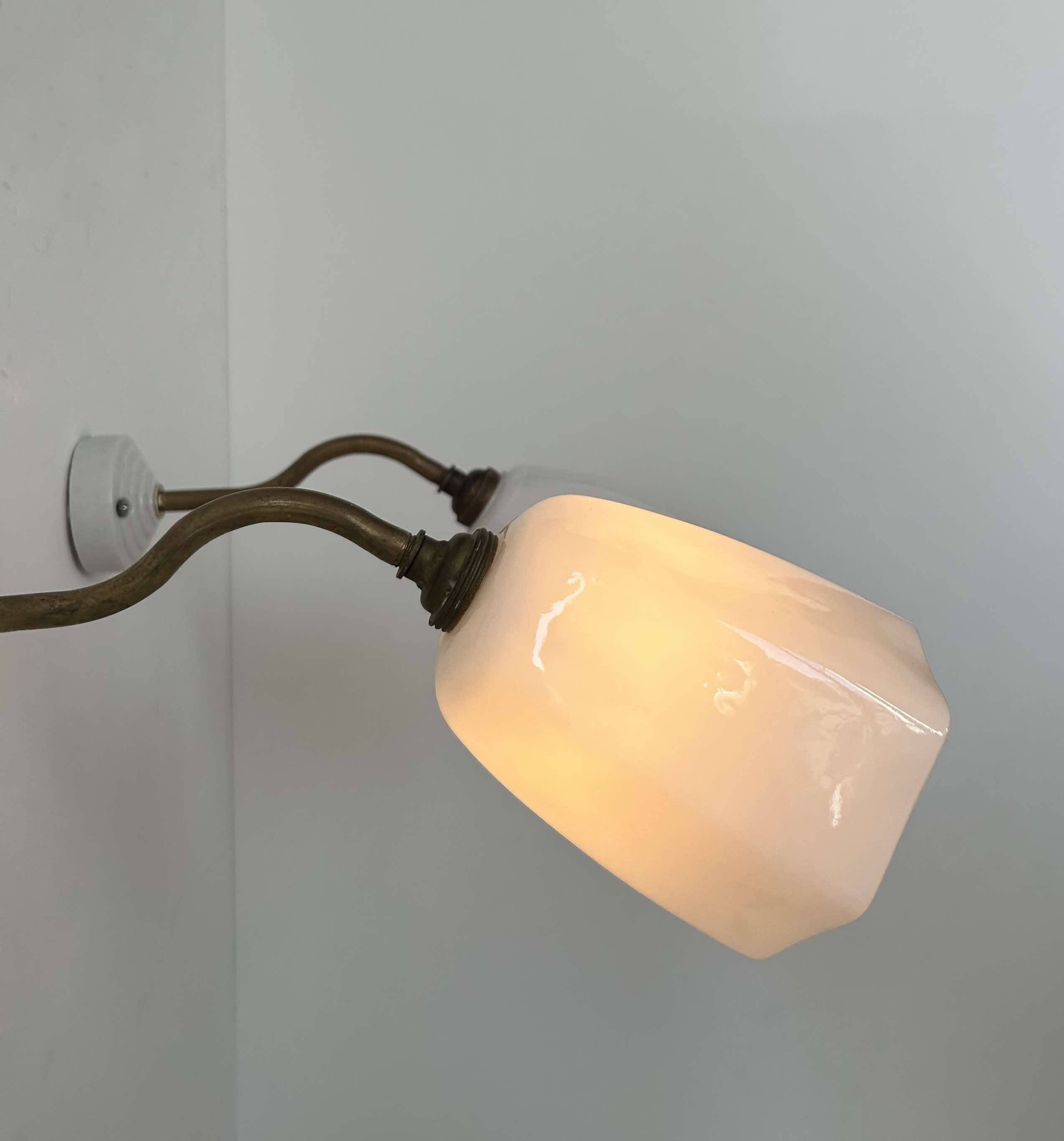 Pair of brass and opaline wall lights, France 1930