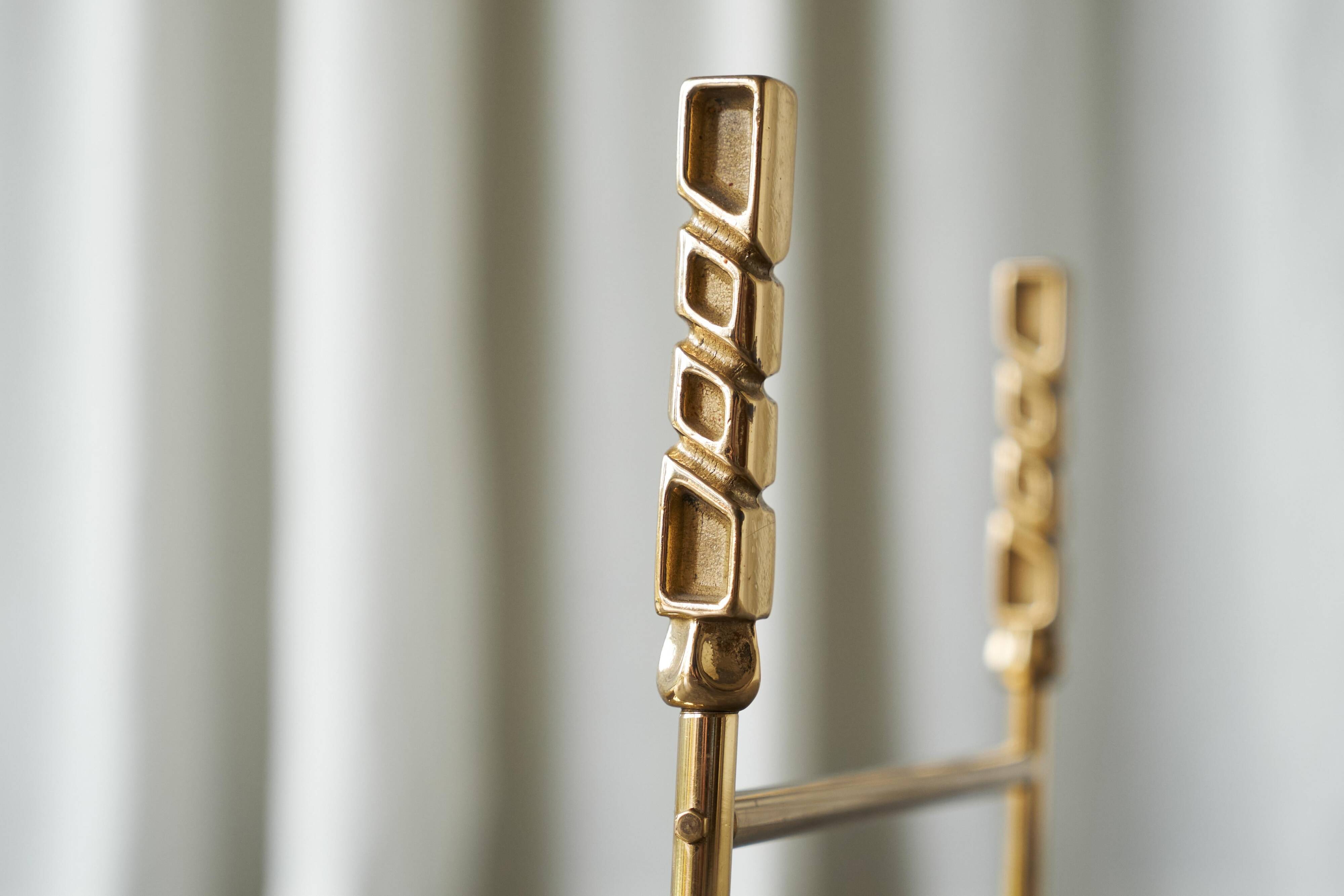 Sculptural brass magazine rack or basket from the 1970s.
