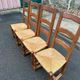 4 dining chairs made of solid wood with straw seats, farmhouse style, medium oak, 20th century, 110cm.