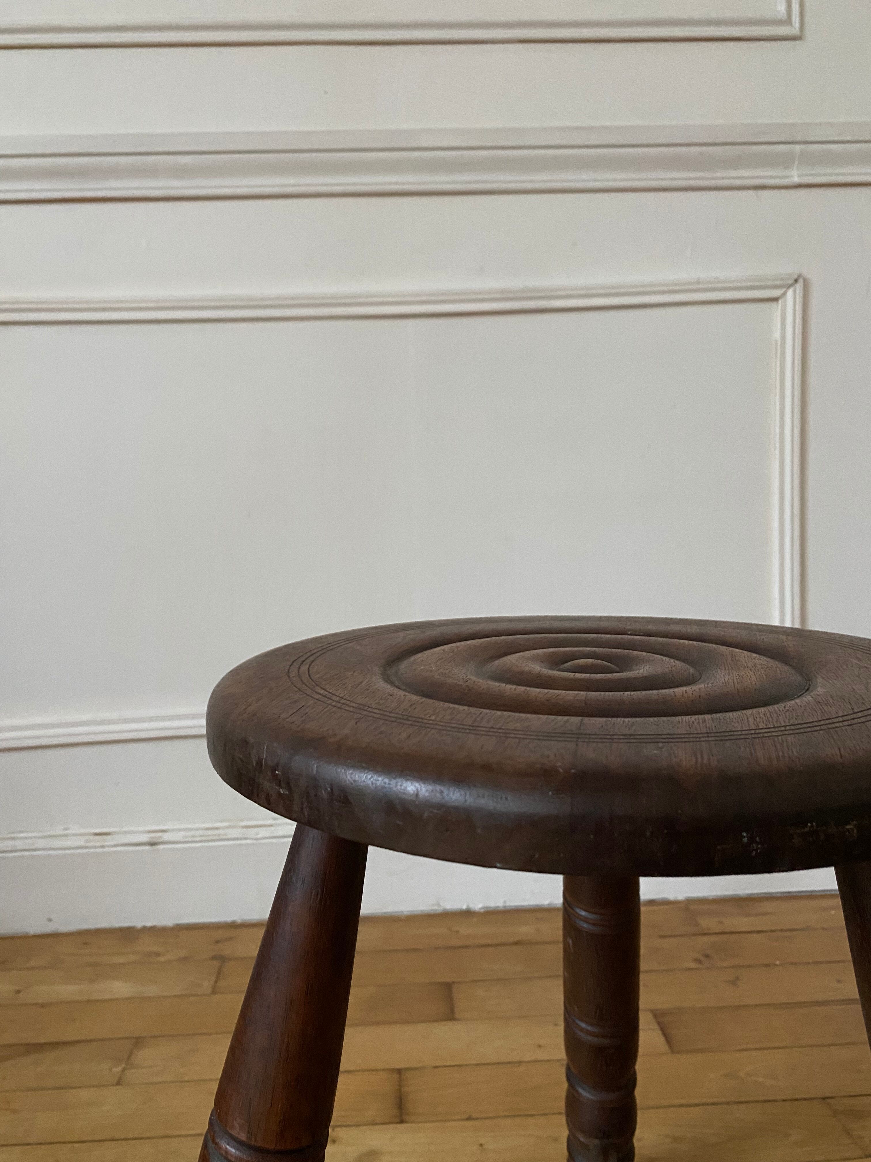 Wooden tripod stool