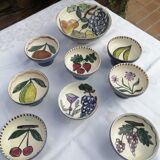 Set of eight cups and a fruit pattern cut, green carpet workshop - circa 1950