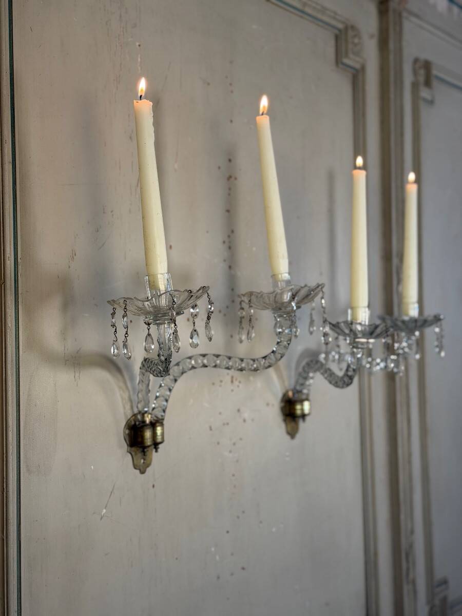 Pair of cut crystal wall sconces in the style of Maydwell and Windle, England, 18th century.