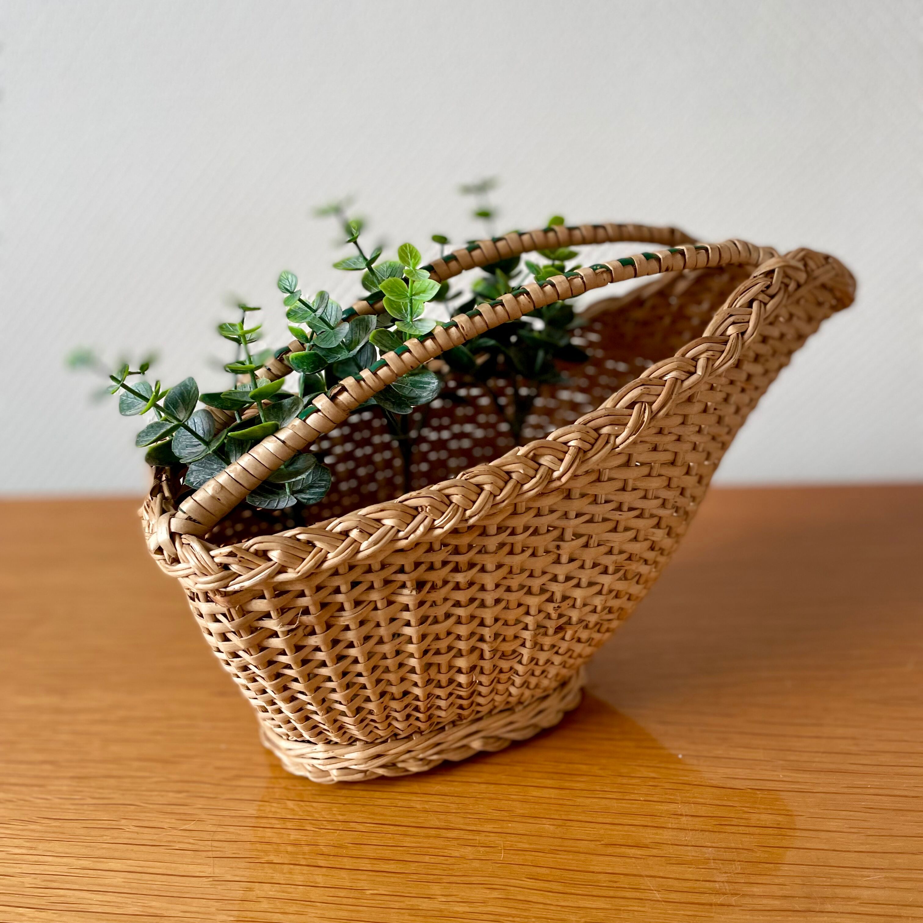 Old rattan pouring basket
