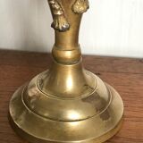 Pair of brass candlesticks with tassels