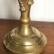 Pair of brass candlesticks with tassels