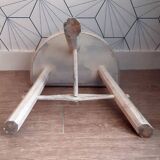 White brutalist tripod stool.