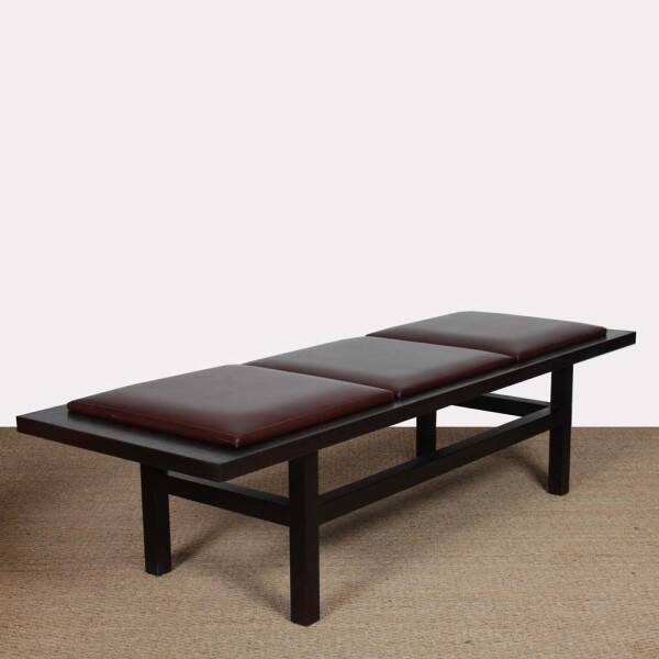 Large black wood and leather bench, 20th century work
