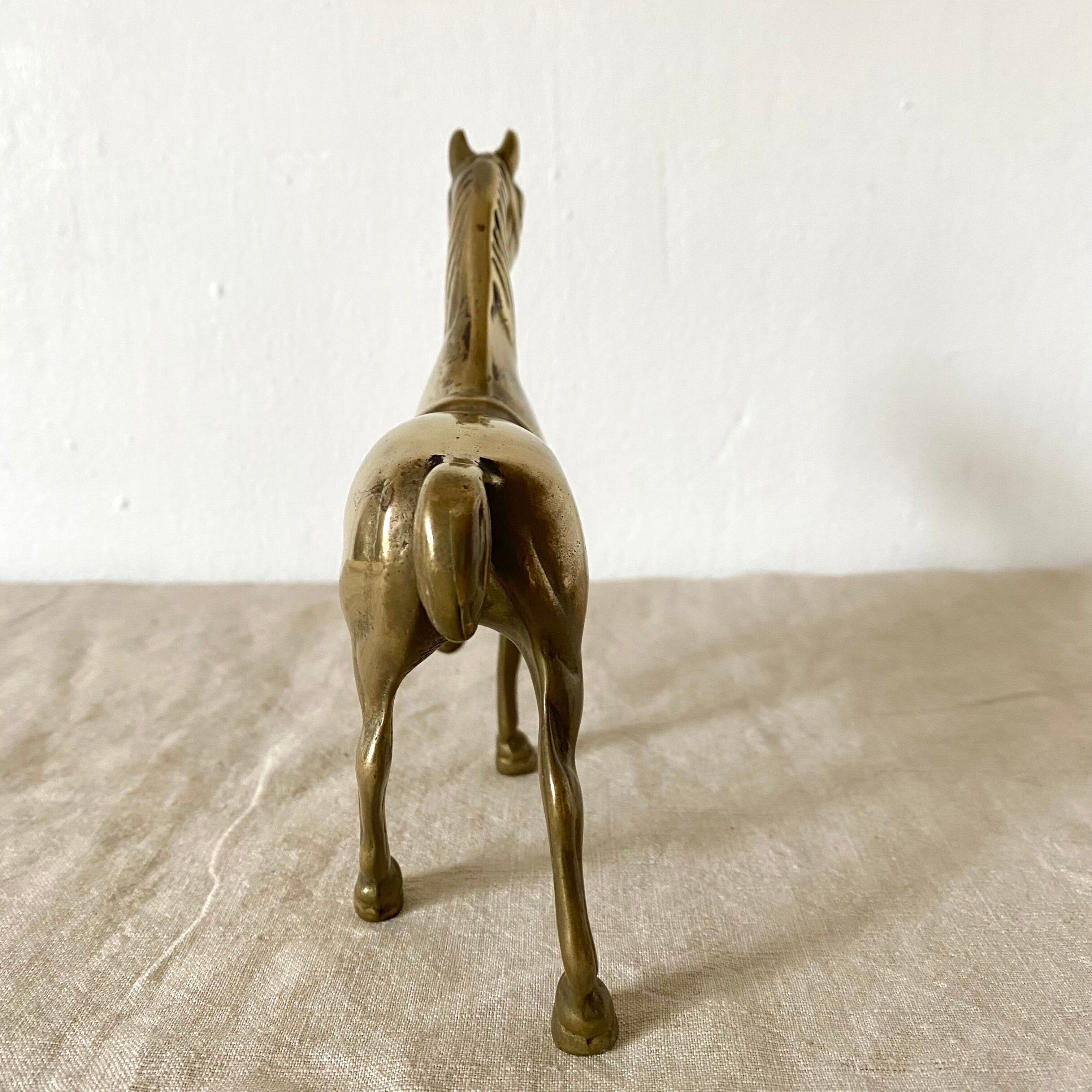 Cheval en laiton doré