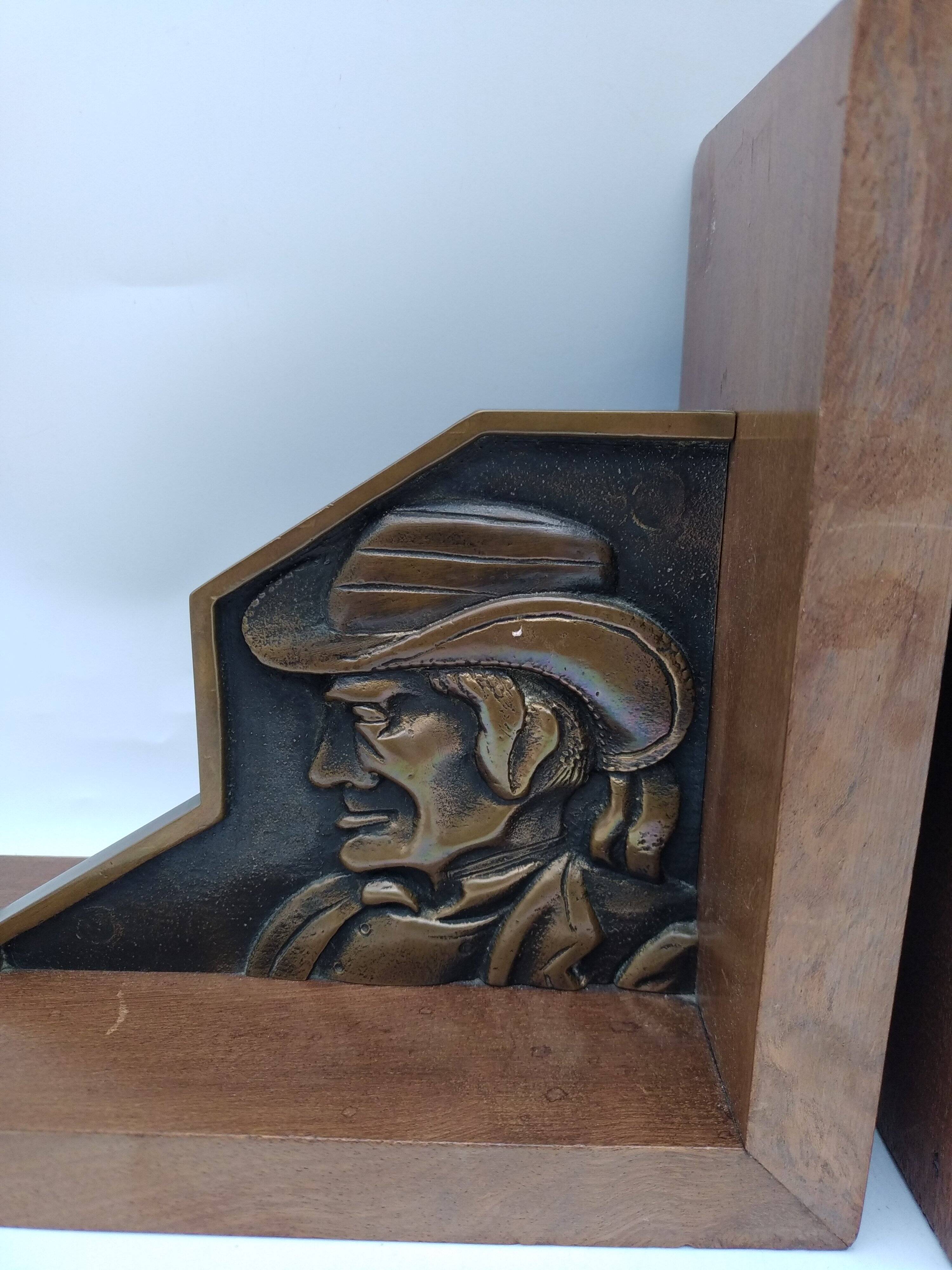 Pair of Breton couple bookends in bronze and wood.
