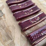 Set of 9 vintage earthenware knife holders